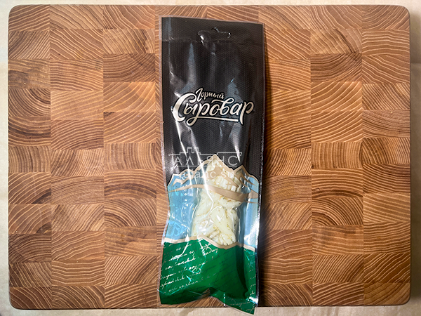 Сыр 100 гр ГОРНЫЙ СЫРОВАР (Косичка с укропом и чесноком) в Солнечногорске